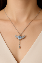 Elegant Silver Angel Wing Pendant with Sparkling Gemstone